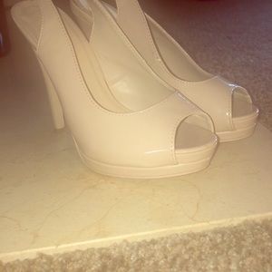 Nude slingback heels